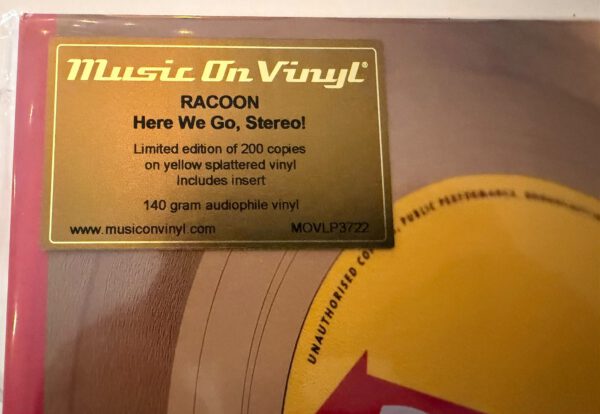 WhatsApp Image 2026-09-12 at 18.14.21 (1) Racoon – Here We Go, Stereo! – yellow splattered vinyl